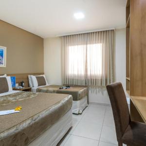 Deluxe Triple Room (1 Double + 1 Single Bed)