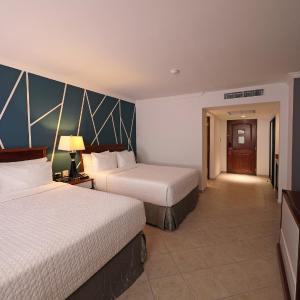 Standard Queen Room with Two Queen Beds and Balcony