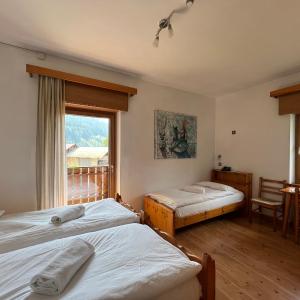 Small Triple Room with Balcony