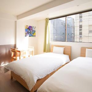 Twin Room with Private Bathroom