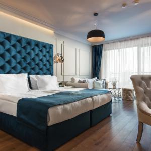 Deluxe Double Room with Balcony and Side Sea View (2 Adults + 2 Children) - Free Parking and Spa Access
