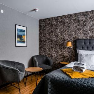 Standard Room with One King Bed and One Bunk Bed