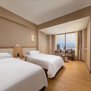 Soul Sojourn · Serene Twin Room (Panoramic Floor-to-Ceiling Windows)