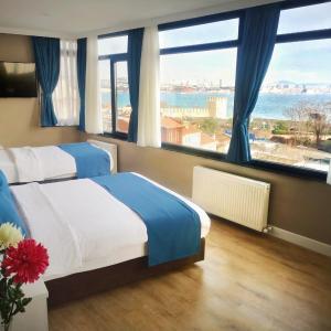 Deluxe Triple Room with Sea View