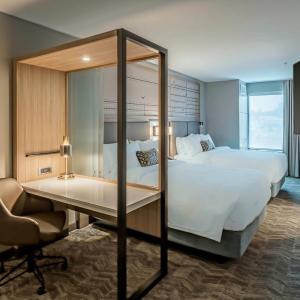 Queen Suite with Two Queen Beds and Trundle Sofa