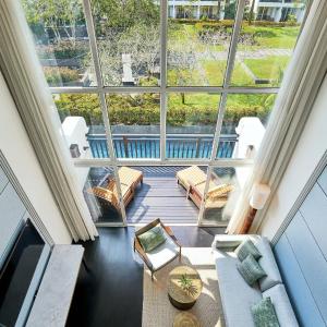 Two-Bedroom Suite with Balcony and Pool View