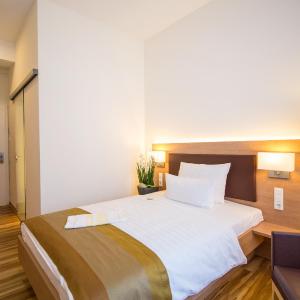 Double room with small bed, annex building