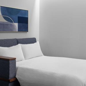 Queen Suite with Two Queen Beds, Living Room and Sofa Bed