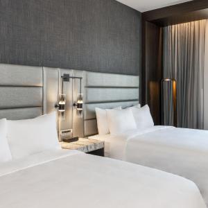 Deluxe Queen Room with Two Queen Beds and City View