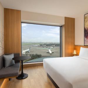 Deluxe Queen Room with Garden View with 50% discount on Buffet , 10% off on Airport Transfers , Laundry and Happy Hours on beverages enjoy 1+1 offer on select beverages