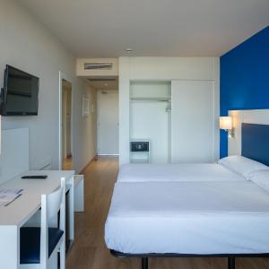 Triple Room (2 Adults + 1 Child)