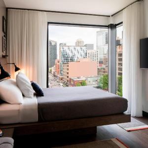 Queen Room with City View and Windows on Two Sides
