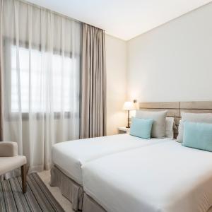 Two-Bedroom Suite with Partial Sea View