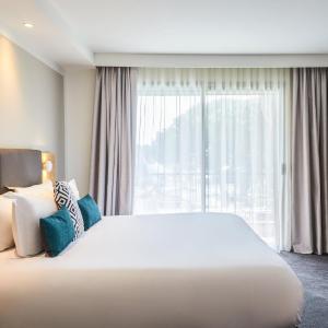 King Suite with Balcony and Pool View