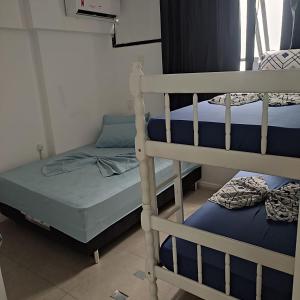 Quarto Privativo Quádruplo com Banheiro Externo