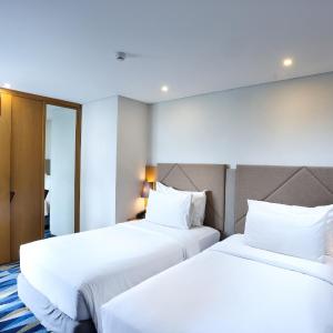 Two-Bedroom Family Suite with Queen and Twin Beds
