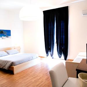 Quadruple Room with Balcony