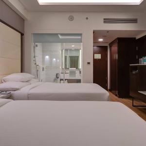 Deluxe Queen Room with 2 Queen Beds - Early Check-in and Late Check-out (Subject to Availability) - 10% Discount on F&B and Laundry till 15th September 2026