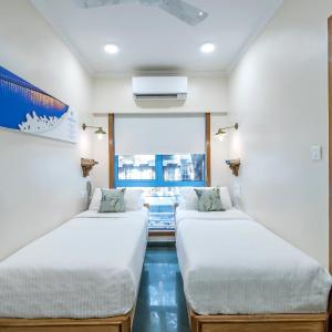 Luxury Room Twin Bed with Complimentary Hi-Tea served with Veg Snack and Live Music during Breakfast Hours