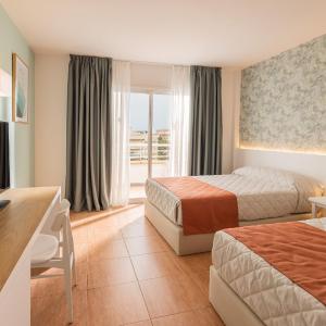 Economy Standard (2 adults + 1 child) with Access to Amusement Park + 1 Access to Ferrari