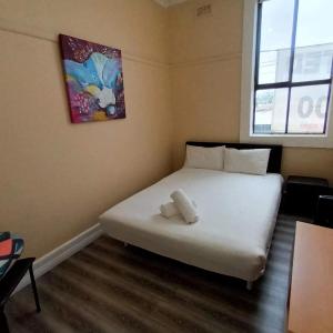 Queen Room with Shared Bathroom