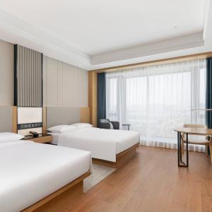 Deluxe Double Room with Two Double Beds and Garden View