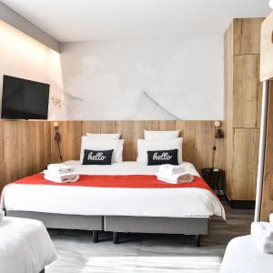 Chambre Tribu (1 lit double et 3 lits une personne)