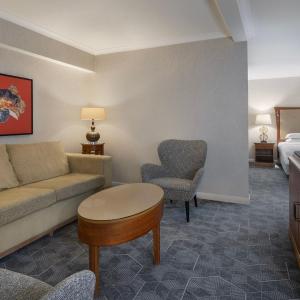 One-Bedroom King Suite with Sofa Bed and Garden View