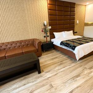 Luxury King Room or Two Queen Bedroom with Balcony and Pool View