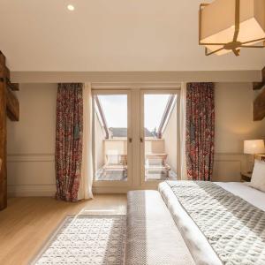 Suite Garden level or with Balcony