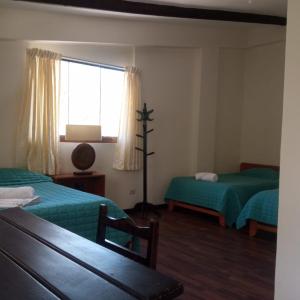 Quadruple Room with Balcony