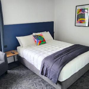 Queen Room with Shared Bathroom