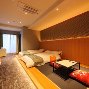 Quadruple Room with Private Bathroom