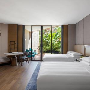 Double Room with Two Double Beds with Balcony and Garden View