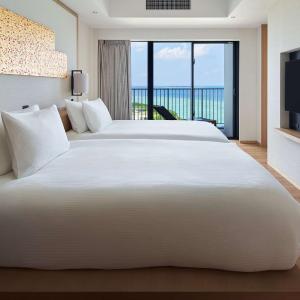 Two-Bedroom Premier Suite with Four Semi Double Beds and Ocean View