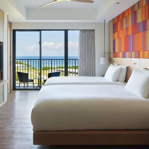 Two-Bedroom Suite with Four Semi Double Beds and Ocean View