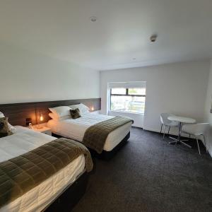 Deluxe Twin Studio with Two Queen Beds