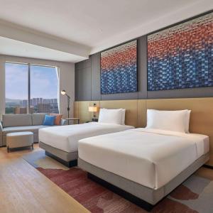 Twin Room with Two Twin Beds and Sofa Bed