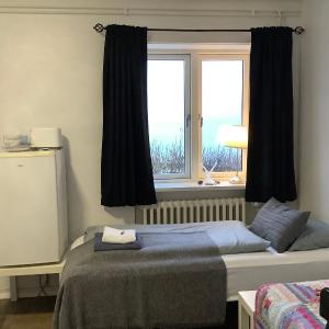 Quadruple Room with Shared Bathroom