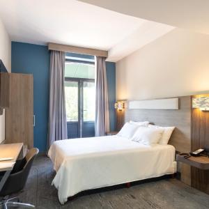 Standard Room with Balcony and City View