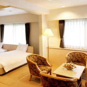 Deluxe Room - 2 Beds and 2 Sofabeds