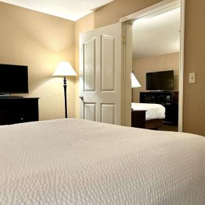 Two-Room Suite with One King and One Queen Bed - Non-Smoking