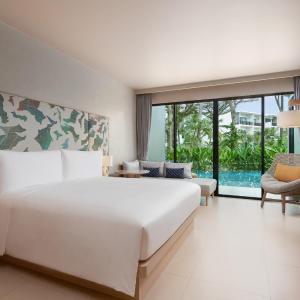 Two-Bedroom Suite with One King Bed and Two Double Beds