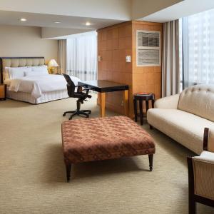 Larger One-Bedroom Huntington King Suite with Living Room, Dining Area and Sofa Bed