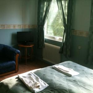 Economy Family Room (2 Adults + 2 Children) with Shared Bathroom