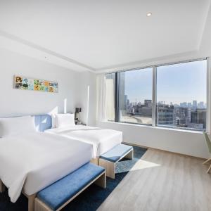 Deluxe Twin Room with Sofa bed