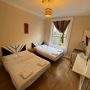 Quadruple Room with Private Bathroom