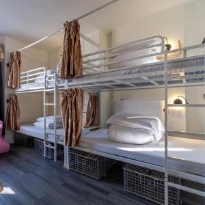 Bed in 8-Bed Female Dormitory Room