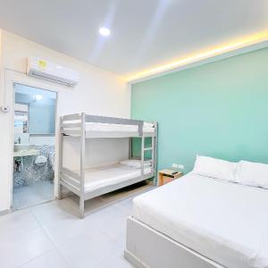 Quadruple Room with Private Bathroom