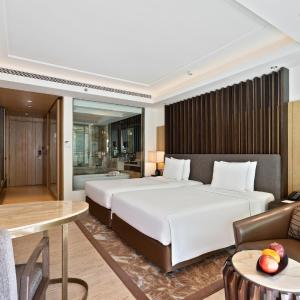 Deluxe Twin Balcony Room with Bathtub - Enjoy INR 1,000 Signature Resort Credit per stay